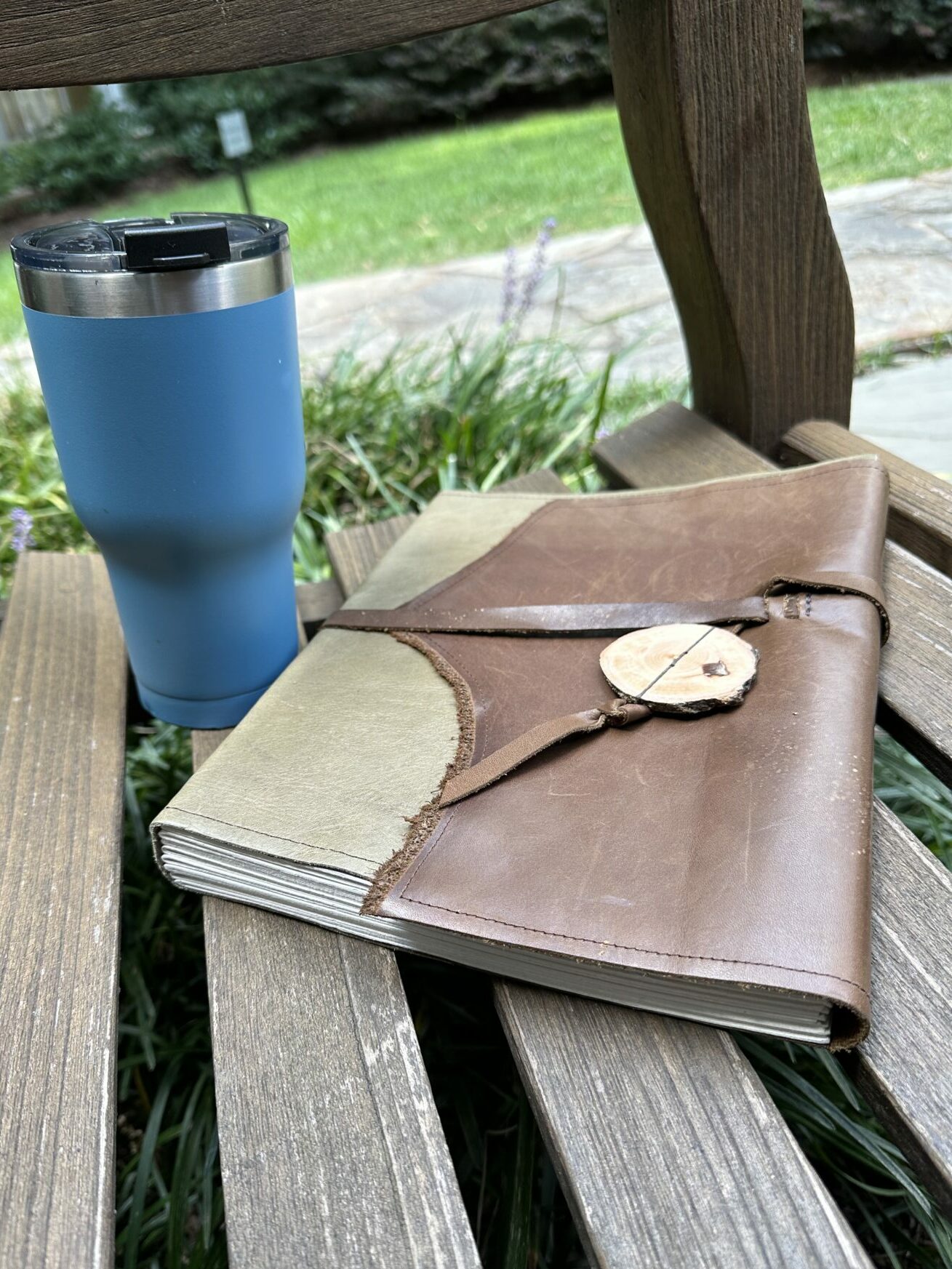 Adventure Journal and Coffee on a bench